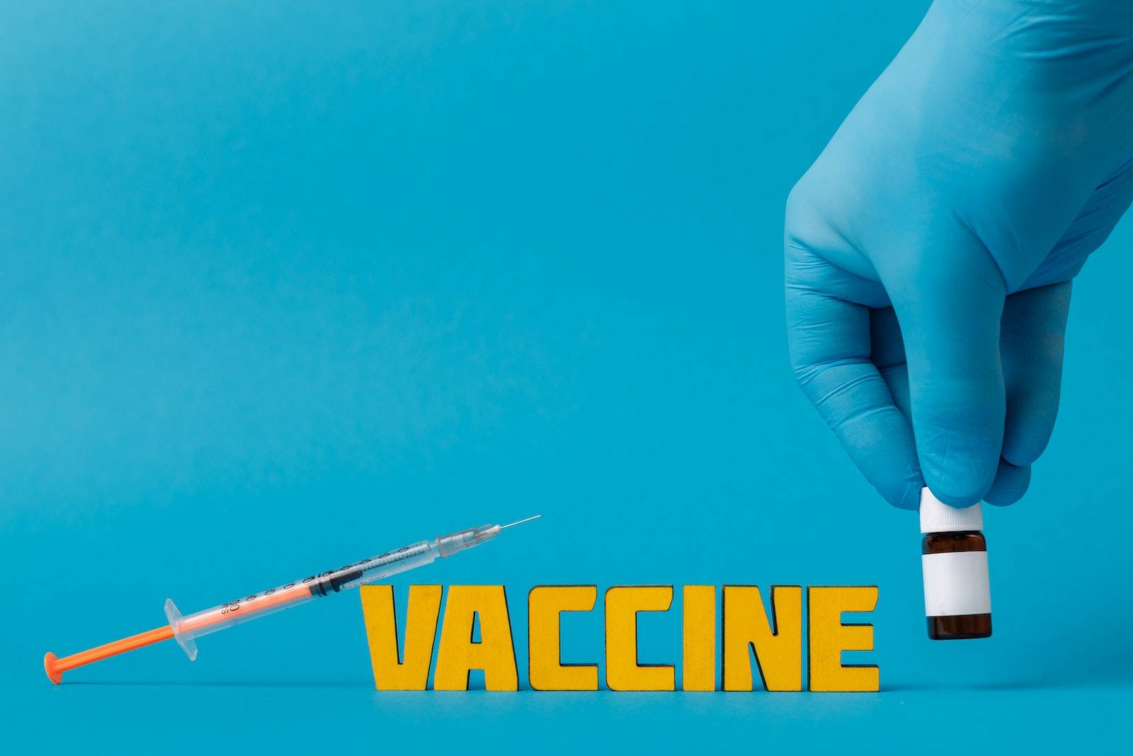 Covid Vaccine on Blue Surface