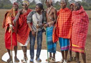 A Group of Men in Red and Blue Traditional Dresses