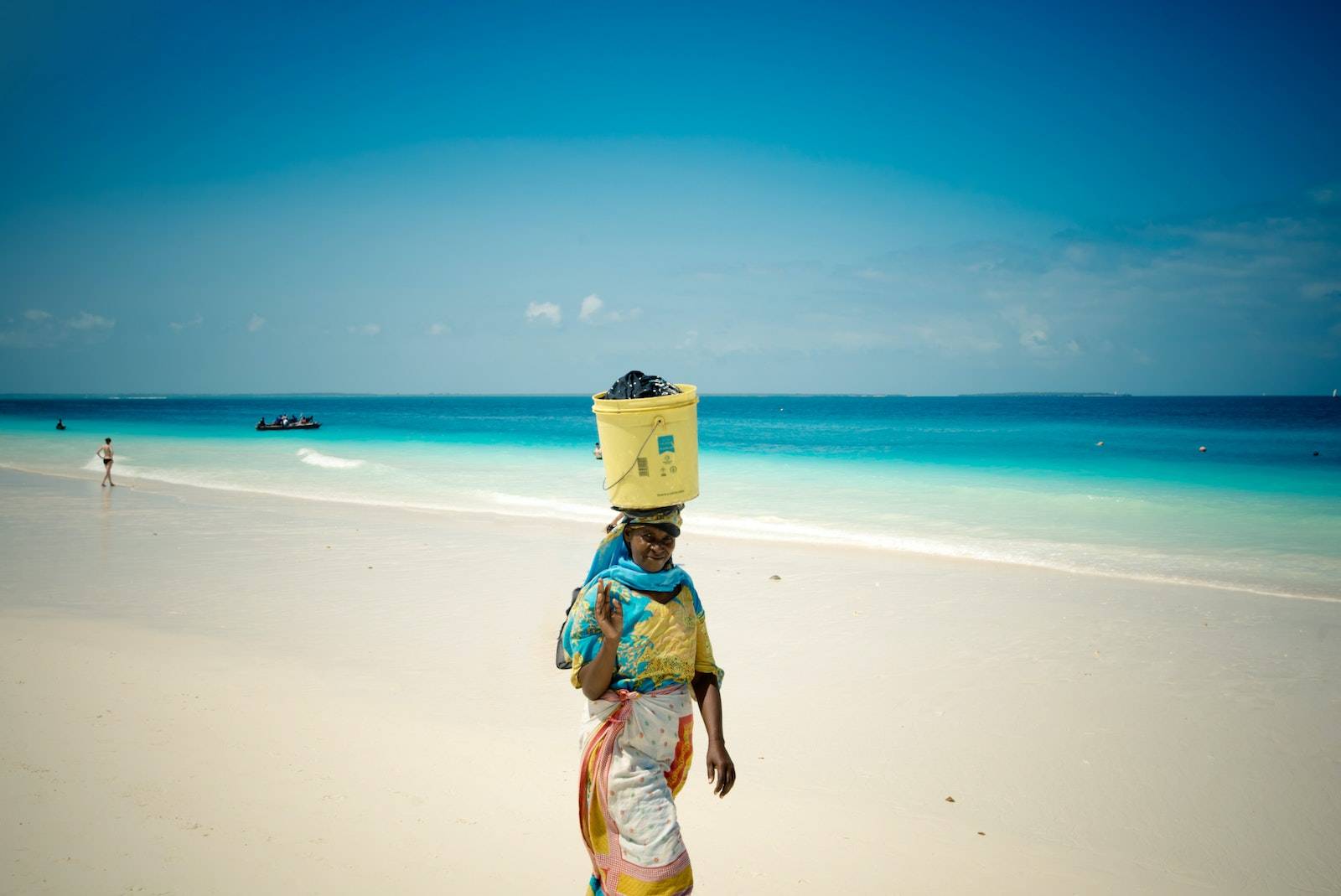 A Woman Walking on the Seashore