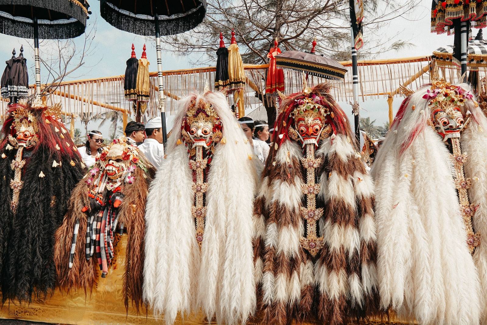 people in red and white costume standing on street during daytime