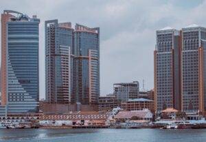 body of water near buildings at daytime